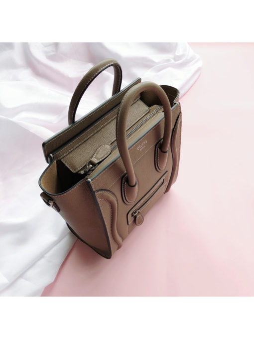 CELINE Luggage Nano. Original Quality Bag including gift box, care book, dust bag, authenticity card.  Nano luggage bag in calfskin with leather handles, a removable shoulder strap, and a zip closure. The bag has a zipped outer pocket on the front. | CRIS&COCO Authentic Quality bags and Accessories