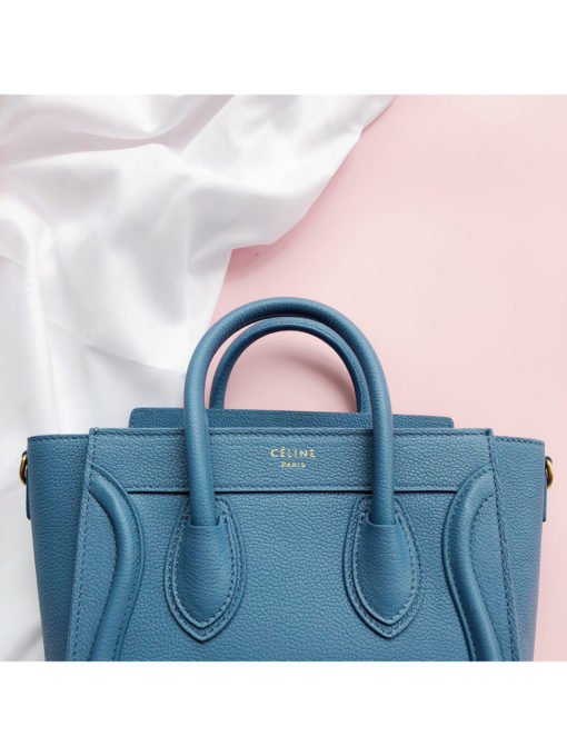 CELINE Luggage Nano. Original Quality Bag including gift box, care book, dust bag, authenticity card.  Nano luggage bag in calfskin with leather handles, a removable shoulder strap, and a zip closure. The bag has a zipped outer pocket on the front. | CRIS&COCO Authentic Quality bags and Accessories