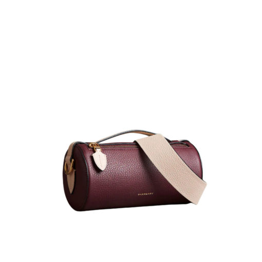 BURBERRY The Leather Barrel Bag. Original Quality Bag including gift box, care book, dust bag, authenticity card. A cylindrical micro bag in block-color leather. Use the military-inspired belt strap to carry it crossbody or on the shoulder. | CRIS&COCO Authentic Quality Designer Bag and Luxury Accessories