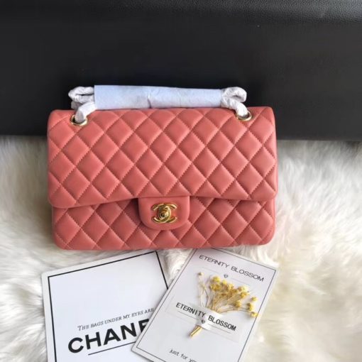 CHANEL Medium Classic Flap Bag. Original Quality Bag. CHANEL Sales Box and Dust Bag. Booklet, Authenticity Card, Payment Slip. Whether you’re a young celeb looking to carry a flashy mini bag in front of the paparazzi or a corporate maven looking for a roomy day bag that announces that you’ve arrived. Many sizes, colors and variations on the Classic Flap mean that there’s likely a version that will suit your purposes. The bags tend to hold their value well for years. | CRIS&COCO | High quality designer bags and authentic luxury