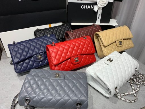 CHANEL Medium Classic Flap Bag. Original Quality Bag. CHANEL Sales Box and Dust Bag. Booklet, Authenticity Card, Payment Slip. Whether you’re a young celeb looking to carry a flashy mini bag in front of the paparazzi or a corporate maven looking for a roomy day bag that announces that you’ve arrived. Many sizes, colors and variations on the Classic Flap mean that there’s likely a version that will suit your purposes. The bags tend to hold their value well for years. | CRIS&COCO | High quality designer bags and authentic luxury