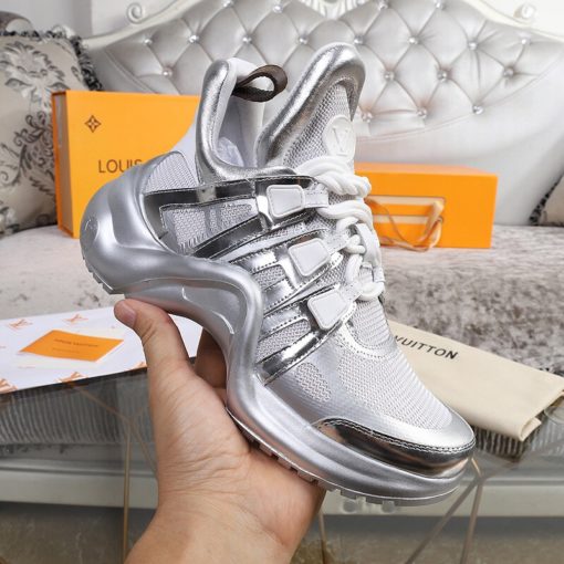 LOUIS VUITTON 'Archlight' Trainer. Original Quality Sneaker including gift box, care book, dust bag, authenticity card. This futuristic sneaker balances a springy wave-shaped outsole and an oversized tongue with a low cut around the ankle for a delicate, feminine touch. | CRIS&COCO | High quality designer bags and luxury accessories