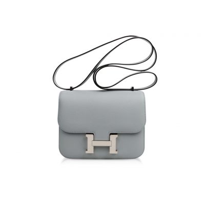 HERMÈS Constance Shoulder Bag. Authentic Quality Bag with literature, dust bag, box and authenticity card. Designed by in-house designer Catherine Chaillet, and named after her daughter, the Hermes Constance Bag is pure elegance. It features sleek lines, a fully adjustable strap, and the iconic “H” clasp. The Constance is a simply, elegant shoulder bag with a long leather strap that can be doubled. | CRIS&COCO Authentic Quality bags and Accessories