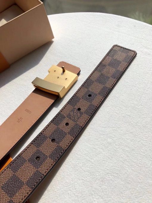 LV Initiales Belt 40 mm. Original Quality Belt including gift box, care book, dust bag, authenticity card. This LV Initiales 40mm Reversible Belt combines plain calf leather with the House’s iconic Damier Cobalt canvas to supply a choice of styles. The plain leather side is perfect for business occasions, while the reverse’s Damier or Monogram canvas creates a more urban feel. | CRIS&COCO Authentic Quality Designer Bags and Luxury Accessories