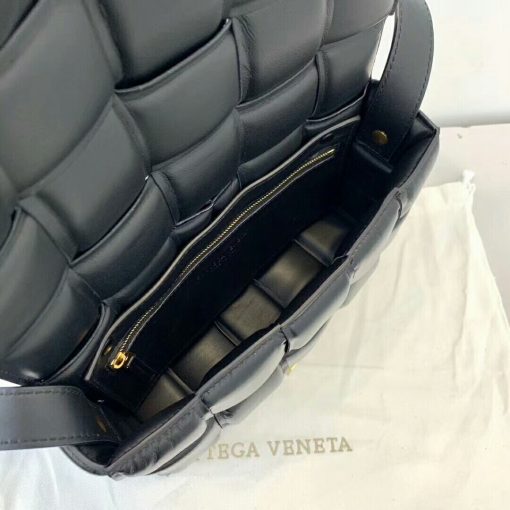 BOTTEGA VENETA Padded Cassette Leather Shoulder Bag. Best Original Quality Bag. Including gift box, literature, dust bag, authenticity card. Creative director Daniel Lee has introduced the Padded Cassette to Bottega Veneta's handbag line. A play on proportion, it features the label's iconic intrecciato technique in a double-faced macro weave. For fans of the brand, this is a must-have addition to your collection. | Cris and Coco the Streetstyle Experience. The Best Quality Designer Bags and Luxury Accessories