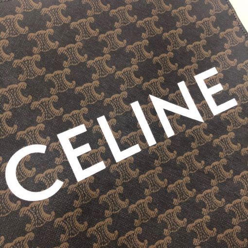 CELINE Vertical Cabas Tote in Triomphe Canvas and Calfskin. Original Quality Bag including gift box, literature, dust bag, authenticity card. The Triomphe bag wasn’t really loved in the beginning, but its gaining traction and fame. The story started with the CELINE Triomphe bag, a magnificent bag that’s named after the Arc the Triomphe. A new chapter has started, CELINE has completed an entire collection of the Triomphe line. It includes a tote bag, bucket bag, camera bag, drawstring bag, and a Boston bag. All of these styles are made from Triomphe canvas and with calfskin trimming. | CRIS AND COCO | Authentic Quality Designer Bags and Luxury Accessories