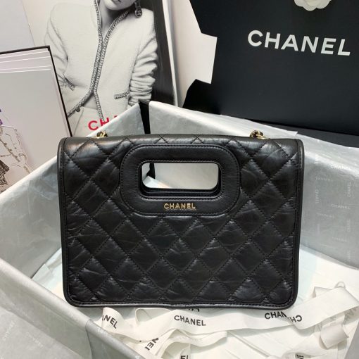 CHANEL Flap Bag with Charms, best high-end quality bag with gift box, dust bag, authenticity card, and CHANEL cloth flower. We love the square-shaped design with a built-in handle for hand carry. Charms give the bag a Punk feel. The center features the CC logo and a woven leather chain strap allows for shoulder carry. | Cris and Coco authentic quality designer bags and luxury accessories.