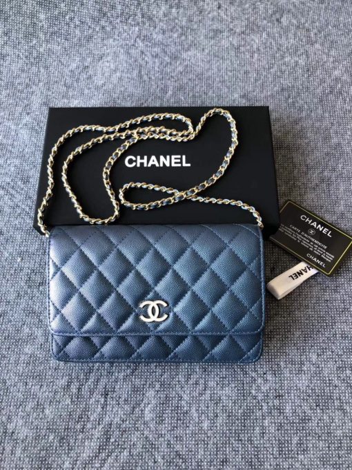 CHANEL Classic Wallet on Chain. Authentic Quality Wallet, including gift box, literature, dust bag, authenticity card. Classic and elegant, a Chanel bag is a fashion statement to your outfit, as seen in this caviar leather flap wallet on chain. Featuring a diamond quilted finish, metal-tone hardware, a foldover top, an internal zipped pocket, an internal slip pocket, an internal logo stamp, a back slip pocket, tortoiseshell details, and a CC turn-lock fastening. | CRIS AND COCO Authentic Quality Designer Bags and Luxury Accessories