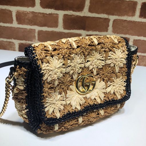 GUCCI GG Marmont Raffia small shoulder bag. Authentic Quality Bag, including gift box, literature, dust bag, authenticity card. An introduction to the GG Marmont line, the small shoulder bag is introduced in the season's coveted raffia effect fabric. An unexpected take on the signature style blends the Double G emblem with the seasonal fabric, reworked to create a textured floral motif that is accented by a black trim and leather details. New shapes and signature Gucci lines are reimagined in a mix of fabrics and trims imbued with an inherent summer feel. | CRIS&COCO Authentic Quality Designer Bag and Luxury Accessories