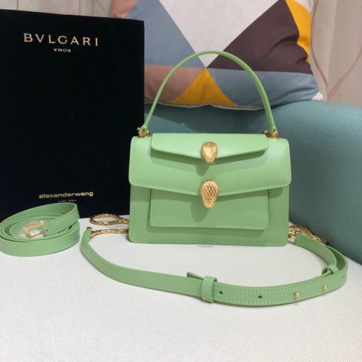 ALEXANDER WANG x BVLGARI Belt Bag. Original Quality Bag including gift box, care book, dust bag, authenticity card. The belt bag is a dream to style, as it features two detachable straps and a detachable handle and can be worn on the waist, as a crossbody bag, as a clutch or over the shoulder. BVLGARI and ALEXANDER WANG have reprised Serpenti Through The Eyes of ALEXANDER WANG for 2020, with the exciting addition of two brand new bags. While the two in-demand fashion houses may not reveal themselves to be the most obvious collaborators at a superficial glance, they have nonetheless merged to produce their latest capsule collection infusing allure with innovation. | Cris and Coco Authentic Quality designer bags and luxury accessories.