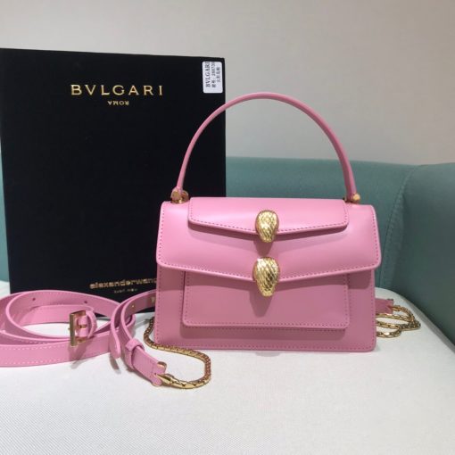 ALEXANDER WANG x BVLGARI Belt Bag. Original Quality Bag including gift box, care book, dust bag, authenticity card. The belt bag is a dream to style, as it features two detachable straps and a detachable handle and can be worn on the waist, as a crossbody bag, as a clutch or over the shoulder. BVLGARI and ALEXANDER WANG have reprised Serpenti Through The Eyes of ALEXANDER WANG for 2020, with the exciting addition of two brand new bags. While the two in-demand fashion houses may not reveal themselves to be the most obvious collaborators at a superficial glance, they have nonetheless merged to produce their latest capsule collection infusing allure with innovation. | Cris and Coco Authentic Quality designer bags and luxury accessories.