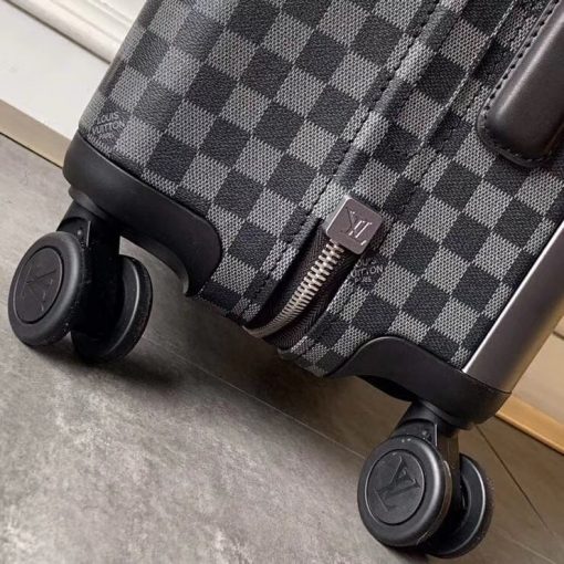 LOUIS VUITTON Horizon 55 Rolling Suitcase Carry On. Original Quality Suitcase including gift box, care book, dust bag, authenticity card. Meet the future of luxurious rolling luggage. Imagined by Marc Newson, widely acknowledged as the most influential industrial designer of his generation, this lightweight 4-wheeled carry-on has a completely flat interior thanks to its large external cane. Every detail exudes innovation and lightness: from the discreet new TSA lock to the most comfortable wheels ever designed by Louis Vuitton. Travel in style with your Horizon 55, which offers surprisingly large interior capacity for a cabin-friendly bag. | CRIS&COCO High-End Designer Bags and Luxury Accessories