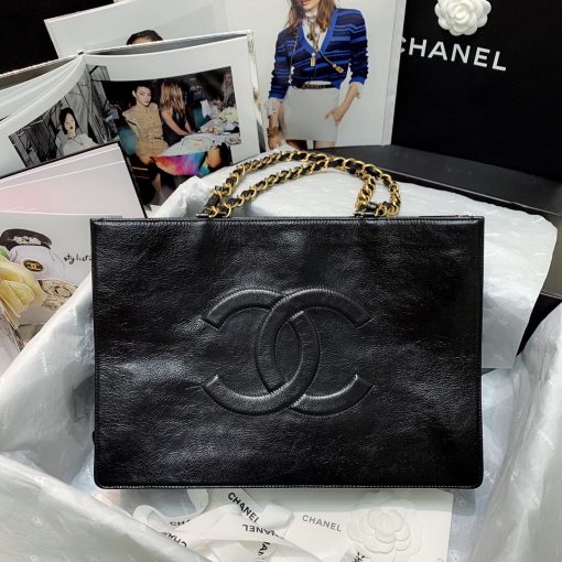 CHANEL Shopping Bag Tote 2020. Original Quality Bag. CHANEL Sales Box and Dust Bag. Booklet, Authenticity Card, Payment Slip. Exuding class and sophistication, the CHANEL Shopping Bag Tote 2020 boasts a real leather construction. Adorned with front logo detail and gold-tone metal hardware, it's the epitome of timeless style. | Cris and Coco Authentic Quality Bags and Luxury Accessories