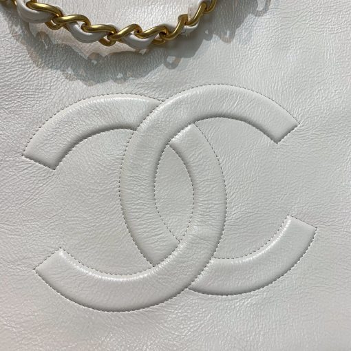 CHANEL Shopping Bag Tote 2020. Original Quality Bag. CHANEL Sales Box and Dust Bag. Booklet, Authenticity Card, Payment Slip. Exuding class and sophistication, the CHANEL Shopping Bag Tote 2020 boasts a real leather construction. Adorned with front logo detail and gold-tone metal hardware, it's the epitome of timeless style. | Cris and Coco Authentic Quality Bags and Luxury Accessories