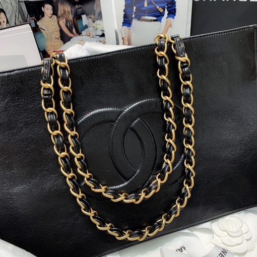 CHANEL Shopping Bag Tote 2020. Original Quality Bag. CHANEL Sales Box and Dust Bag. Booklet, Authenticity Card, Payment Slip. Exuding class and sophistication, the CHANEL Shopping Bag Tote 2020 boasts a real leather construction. Adorned with front logo detail and gold-tone metal hardware, it's the epitome of timeless style. | Cris and Coco Authentic Quality Bags and Luxury Accessories