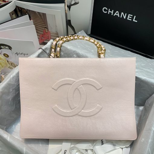 CHANEL Shopping Bag Tote 2020. Original Quality Bag. CHANEL Sales Box and Dust Bag. Booklet, Authenticity Card, Payment Slip. Exuding class and sophistication, the CHANEL Shopping Bag Tote 2020 boasts a real leather construction. Adorned with front logo detail and gold-tone metal hardware, it's the epitome of timeless style. | Cris and Coco Authentic Quality Bags and Luxury Accessories