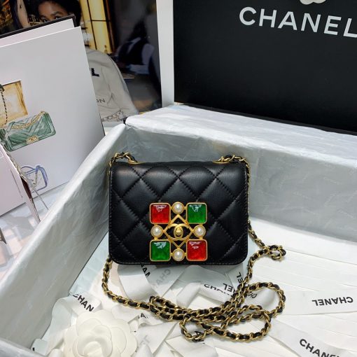 CHANEL Small Flap Bag with Crystal Pearls and Resin. Original Quality Bag including gift box, care book, dust bag, authenticity card. Chanel has introduced the Small Flap Bag in a bejeweled variant at Fall-Winter 2020/21 season. The bag is subtly blingy featuring faux pearls and Chanel’s Gripoix (poured glass jewels) on the clasp. | CRIS&COCO Authentic Quality Designer Bags and Luxury Accessories