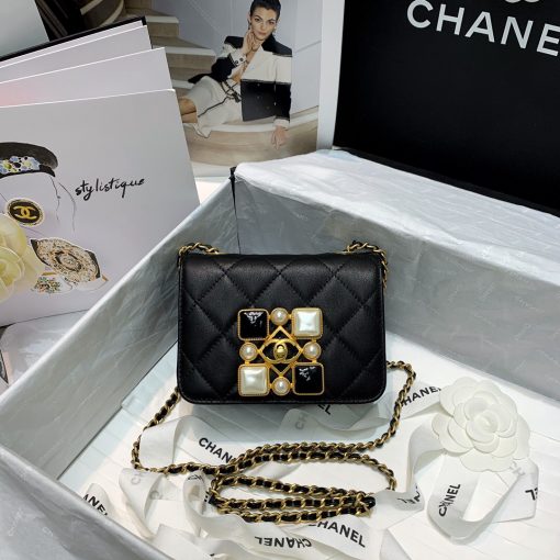 CHANEL Small Flap Bag with Crystal Pearls and Resin. Original Quality Bag including gift box, care book, dust bag, authenticity card. Chanel has introduced the Small Flap Bag in a bejeweled variant at Fall-Winter 2020/21 season. The bag is subtly blingy featuring faux pearls and Chanel’s Gripoix (poured glass jewels) on the clasp. | CRIS&COCO Authentic Quality Designer Bags and Luxury Accessories