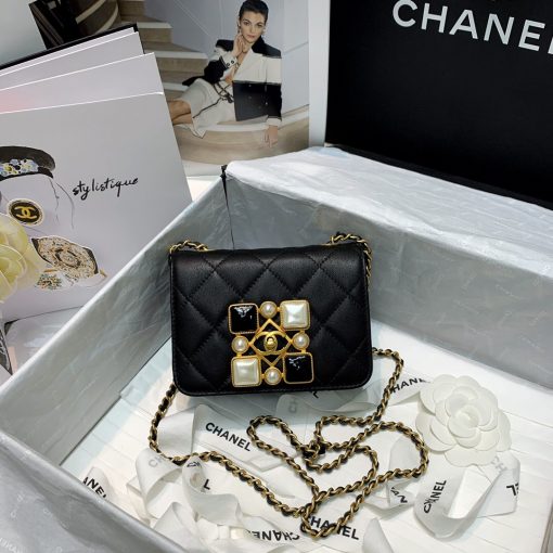 CHANEL Small Flap Bag with Crystal Pearls and Resin. Original Quality Bag including gift box, care book, dust bag, authenticity card. Chanel has introduced the Small Flap Bag in a bejeweled variant at Fall-Winter 2020/21 season. The bag is subtly blingy featuring faux pearls and Chanel’s Gripoix (poured glass jewels) on the clasp. | CRIS&COCO Authentic Quality Designer Bags and Luxury Accessories