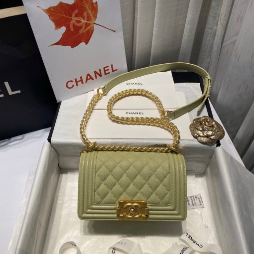 CHANEL Small Boy Handbag. Original Quality Bag including gift box, care book, dust bag, authenticity card. Even though the Boy was only introduced in 2011, the style has quickly achieved the status of an icon. Designed by Karl Lagerfeld and named after Boy Capel, the now legendary love of Coco Chanel’s life, the bag encapsulates masculine chic conveyed through rigid structure, boxy shape and sharp corners. This CHANEL Small Handbag is instantly recognizable for its simple, boxy silhouette and sharp corners, embellished only with a contrasting, bold-looking link chain strap which is the main feature of the bag. This most popular variations of the Chanel Boy are available in either caviar or lambskin. There are no external pockets and the sole adornment is the quilted fascia. | CRIS&COCO Authentic Quality Designer Bags and Luxury Accessories