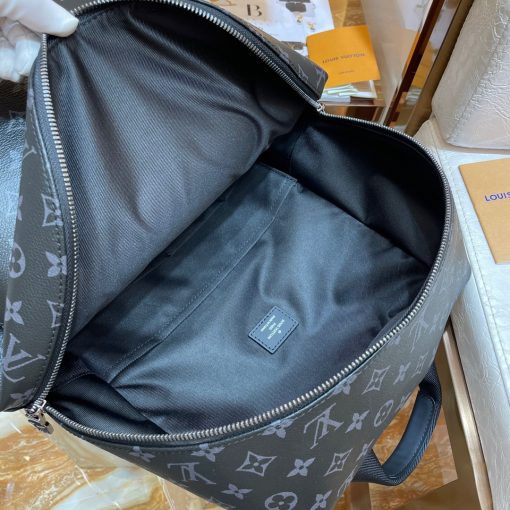 LOUIS VUITTON Discovery Backpack PM. Original Quality Backpack including gift box, care book, dust bag, authenticity card. Perfect for those who want a casual yet sophisticated bag, the Discovery Backpack in supple Monogram Eclipse coated canvas delivers both style and versatility. It boasts distinctive details like an ultra-comfortable leather strap and a front pocket with a magnetic closure. | CRIS&COCO Authentic Quality Designer Bags and Luxury Accessories