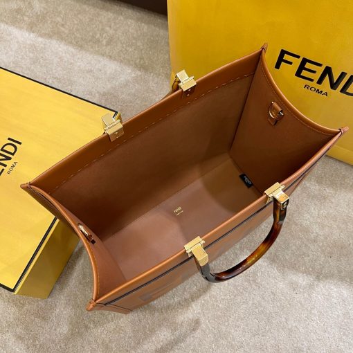 FENDI Sunshine Medium Tote. Original Quality Bag including gift box, care book, dust bag, authenticity card. Equipped with a spacious lined internal compartment, edges in tone on tone leather, and gold-finish hardware. Can be carried by hand or worn on the shoulder thanks to the two handles and detachable shoulder strap.| CRIS&COCO Authentic Quality Designer Bags and Luxury Accessories