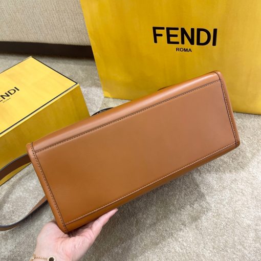 FENDI Sunshine Medium Tote. Original Quality Bag including gift box, care book, dust bag, authenticity card. Equipped with a spacious lined internal compartment, edges in tone on tone leather, and gold-finish hardware. Can be carried by hand or worn on the shoulder thanks to the two handles and detachable shoulder strap.| CRIS&COCO Authentic Quality Designer Bags and Luxury Accessories