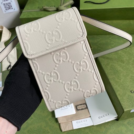 GUCCI GG Embossed Mini Bag.