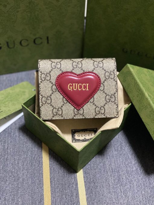 GUCCI GG Supreme Canvas Heart Logo Bag.