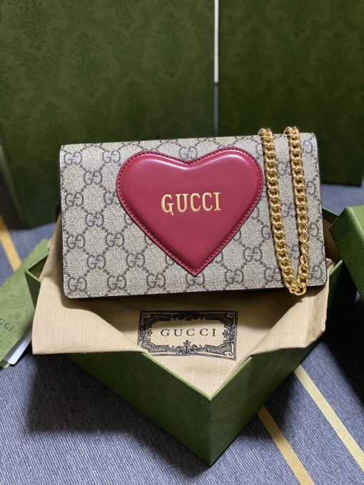 GUCCI GG Supreme Canvas Heart Logo Bag.