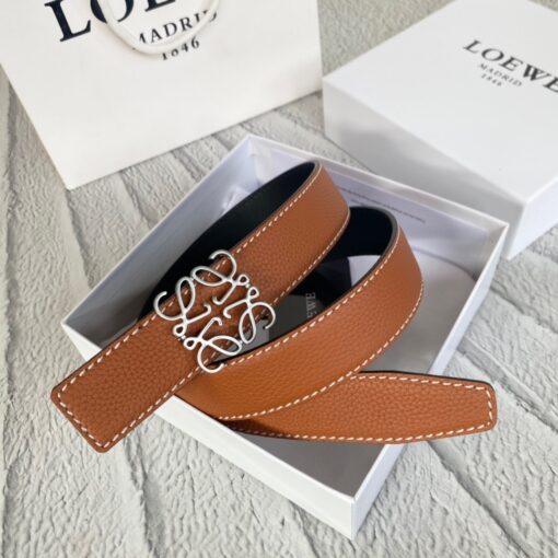 LOEWE Anagram Belt. Original Quality Belt including gift box, care book, dust bag, authenticity card. This belt is crafted in smooth calfskin with a LOEWE Anagram buckle. The label’s now-iconic Anagram – rendered in gleaming golden/silver/black tone metal – takes no lesser pride of place, though. Originally designed in 1970 in homage to the label’s founder and refreshed when Jw Anderson took over the reins, it’s an icon that points to the past and future at once.  | CRIS&COCO Authentic Quality Designer Bag and Luxury Accessories