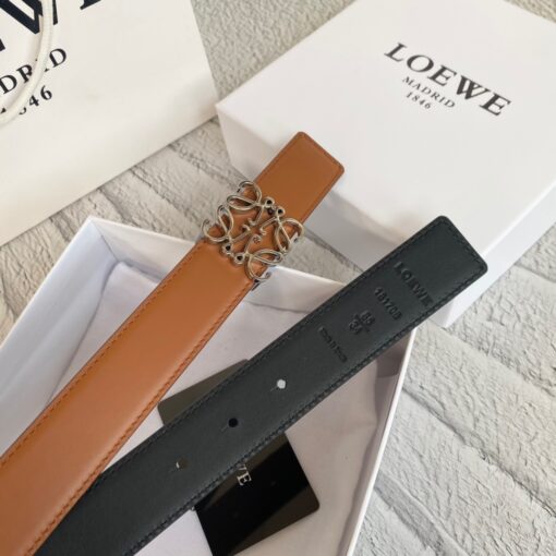 LOEWE Anagram Belt. Original Quality Belt including gift box, care book, dust bag, authenticity card. This belt is crafted in smooth calfskin with a LOEWE Anagram buckle. The label’s now-iconic Anagram – rendered in gleaming golden/silver/black tone metal – takes no lesser pride of place, though. Originally designed in 1970 in homage to the label’s founder and refreshed when Jw Anderson took over the reins, it’s an icon that points to the past and future at once.  | CRIS&COCO Authentic Quality Designer Bag and Luxury Accessories