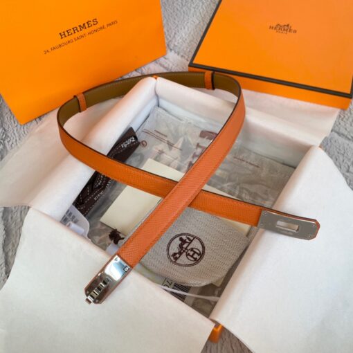 HERMÈS Kelly 18 Belt. Original Quality Belt including gift box, care book, dust bag, authenticity card. The variations of these one size fits all belts change the ways in which they can be worn by adjusting to all sizes while reinterpreting classic Hermes pieces with clever jewel clasps. Thanks to the clever sliding system, this one-size-fits-most belt may be worn at the waist or on the hips. | CRIS&COCO Authentic Quality Designer Bag and Luxury Accessories