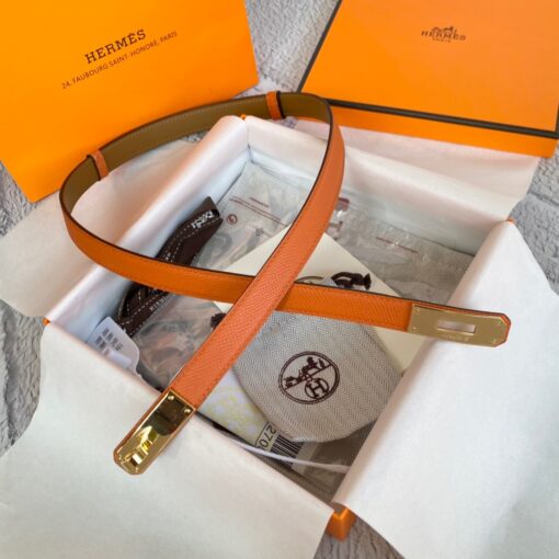 HERMÈS Kelly 18 Belt. Original Quality Belt including gift box, care book, dust bag, authenticity card. The variations of these one size fits all belts change the ways in which they can be worn by adjusting to all sizes while reinterpreting classic Hermes pieces with clever jewel clasps. Thanks to the clever sliding system, this one-size-fits-most belt may be worn at the waist or on the hips. | CRIS&COCO Authentic Quality Designer Bag and Luxury Accessories