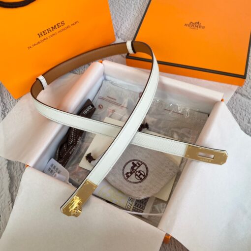 HERMÈS Kelly 18 Belt. Original Quality Belt including gift box, care book, dust bag, authenticity card. The variations of these one size fits all belts change the ways in which they can be worn by adjusting to all sizes while reinterpreting classic Hermes pieces with clever jewel clasps. Thanks to the clever sliding system, this one-size-fits-most belt may be worn at the waist or on the hips. | CRIS&COCO Authentic Quality Designer Bag and Luxury Accessories