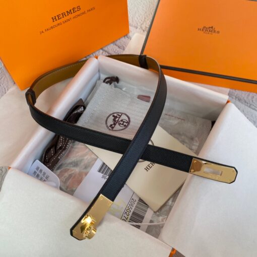 HERMÈS Kelly 18 Belt. Original Quality Belt including gift box, care book, dust bag, authenticity card. The variations of these one size fits all belts change the ways in which they can be worn by adjusting to all sizes while reinterpreting classic Hermes pieces with clever jewel clasps. Thanks to the clever sliding system, this one-size-fits-most belt may be worn at the waist or on the hips. | CRIS&COCO Authentic Quality Designer Bag and Luxury Accessories