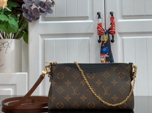 LOUIS VUITTON Pallas Clutch Bag. Original Quality Bag including gift box, care book, dust bag, authenticity card. It’s covered in Monogram Canvas and has multiple carry options like on your shoulder or even cross body. Make use of the leather strap or the golden chain. Use it as a Wallet on Chain bag, it’s just ideal for the evenings or when you want to carry a small but gorgeous handbag. Also, it matches to every casual outfit. This Clutch Bag is refined with golden color metallic pieces; it comes with zipped central compartment and an exterior front pocket. | CRIS&COCO Authentic Quality Designer Bags and Luxury Accessories