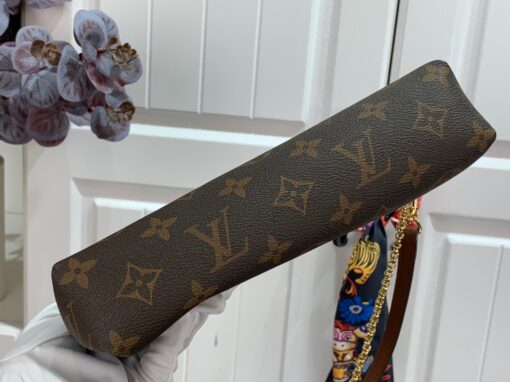 LOUIS VUITTON Pallas Clutch Bag. Original Quality Bag including gift box, care book, dust bag, authenticity card. It’s covered in Monogram Canvas and has multiple carry options like on your shoulder or even cross body. Make use of the leather strap or the golden chain. Use it as a Wallet on Chain bag, it’s just ideal for the evenings or when you want to carry a small but gorgeous handbag. Also, it matches to every casual outfit. This Clutch Bag is refined with golden color metallic pieces; it comes with zipped central compartment and an exterior front pocket. | CRIS&COCO Authentic Quality Designer Bags and Luxury Accessories