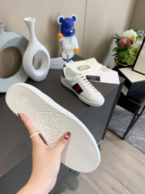 GUCCI Sneaker. Original Quality Sneaker including gift box, care book, dust bag, authenticity card. The classic low-top sneaker in leather with Web detail. These are so great that they would soon become a part of your every day wardrobe. | CRIS&COCO Authentic Quality Designer Bags and Luxury Accessories