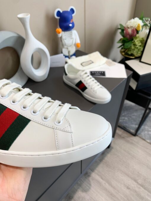 GUCCI Sneaker. Original Quality Sneaker including gift box, care book, dust bag, authenticity card. The classic low-top sneaker in leather with Web detail. These are so great that they would soon become a part of your every day wardrobe. | CRIS&COCO Authentic Quality Designer Bags and Luxury Accessories