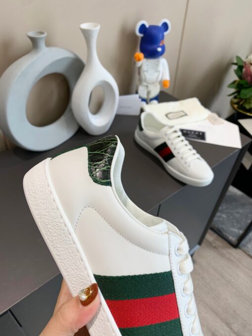 GUCCI Sneaker. Original Quality Sneaker including gift box, care book, dust bag, authenticity card. The classic low-top sneaker in leather with Web detail. These are so great that they would soon become a part of your every day wardrobe. | CRIS&COCO Authentic Quality Designer Bags and Luxury Accessories