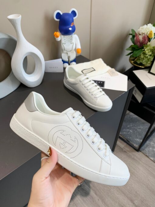 GUCCI Sneaker. Original Quality Sneaker including gift box, care book, dust bag, authenticity card. The classic low-top sneaker in leather with Web detail. These are so great that they would soon become a part of your every day wardrobe. | CRIS&COCO Authentic Quality Designer Bags and Luxury Accessories