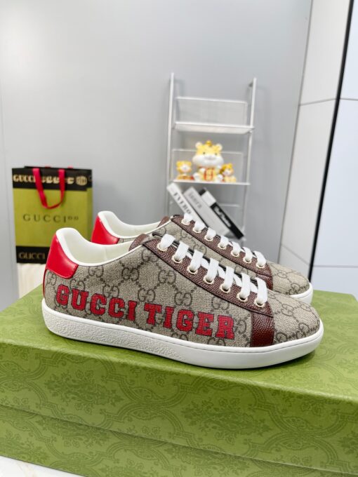 GUCCI Sneaker. Original Quality Sneaker including gift box, care book, dust bag, authenticity card. The classic low-top sneaker in leather with Web detail. These are so great that they would soon become a part of your every day wardrobe. | CRIS&COCO Authentic Quality Designer Bags and Luxury Accessories