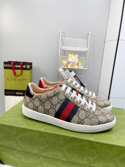 GUCCI Sneaker. Original Quality Sneaker including gift box, care book, dust bag, authenticity card. The classic low-top sneaker in leather with Web detail. These are so great that they would soon become a part of your every day wardrobe. | CRIS&COCO Authentic Quality Designer Bags and Luxury Accessories