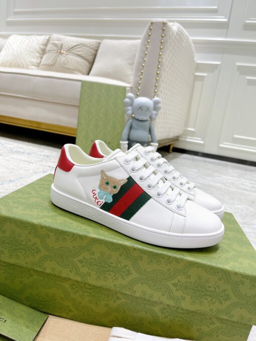 GUCCI Sneaker. Original Quality Sneaker including gift box, care book, dust bag, authenticity card. The classic low-top sneaker in leather with Web detail. These are so great that they would soon become a part of your every day wardrobe. | CRIS&COCO Authentic Quality Designer Bags and Luxury Accessories