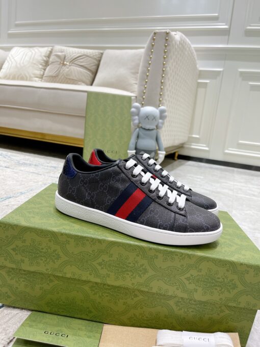 GUCCI Sneaker. Original Quality Sneaker including gift box, care book, dust bag, authenticity card. The classic low-top sneaker in leather with Web detail. These are so great that they would soon become a part of your every day wardrobe. | CRIS&COCO Authentic Quality Designer Bags and Luxury Accessories