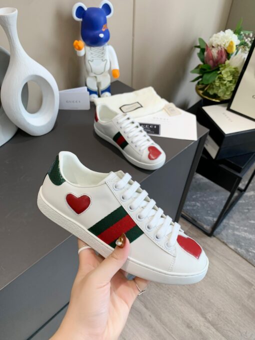 GUCCI Sneaker. Original Quality Sneaker including gift box, care book, dust bag, authenticity card. The classic low-top sneaker in leather with Web detail. These are so great that they would soon become a part of your every day wardrobe. | CRIS&COCO Authentic Quality Designer Bags and Luxury Accessories