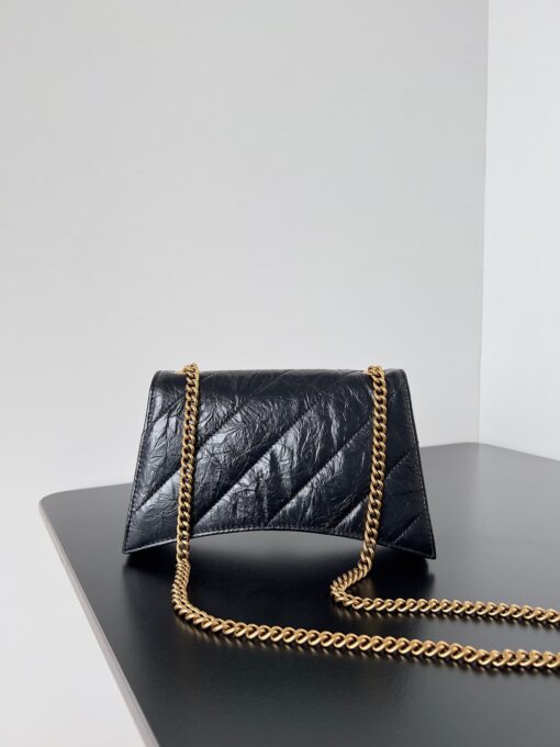 BALENCIAGA Crush Small Chain Bag. Original Quality Bag including gift box, care book, dust bag, authenticity card. Crush on this metallic Crush Chain Bag. This is a new iteration on their celebrated curvilinear design, complete with tonal B logo hardware and shoulder and crossbody chain. Crafted in a contemporary crushed quilted calfskin. | CRIS&COCO Authentic Quality Designer Bags and Luxury Accessories