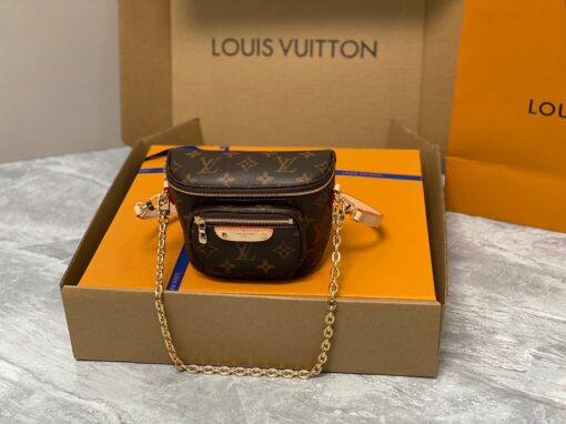 LOUIS VUITTON Mini Bumbag. High-End Quality Bag including gift box, care book, dust bag, authenticity card. Part of Louis Vuitton's Gradient Collection, the Mini Bumbag is an elegant take on the on-trend bag format. Crafted from Monogram Empreinte leather with a stunning printed gradation of colors, this bag will make a stylish addition to your accessory wardrobe. It features a zipped main compartment with a front pocket adorned with a Louis Vuitton leather tag as well as adjustable, removable straps that you can use for either cross-body or shoulder wear. This Mini Bumbag also comes with a stylish, gold-tone chain making it the perfect accessory for any summer occasion. | CRIS AND COCO Authentic Quality Luxury Accessories