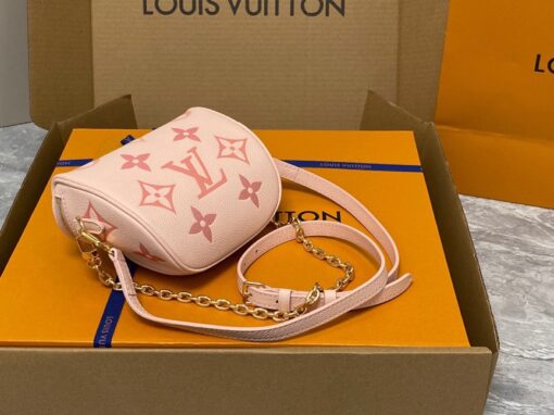 LOUIS VUITTON Mini Bumbag. High-End Quality Bag including gift box, care book, dust bag, authenticity card. Part of Louis Vuitton's Gradient Collection, the Mini Bumbag is an elegant take on the on-trend bag format. Crafted from Monogram Empreinte leather with a stunning printed gradation of colors, this bag will make a stylish addition to your accessory wardrobe. It features a zipped main compartment with a front pocket adorned with a Louis Vuitton leather tag as well as adjustable, removable straps that you can use for either cross-body or shoulder wear. This Mini Bumbag also comes with a stylish, gold-tone chain making it the perfect accessory for any summer occasion. | CRIS AND COCO Authentic Quality Luxury Accessories